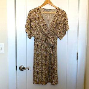 Smokin hot!  Like new JLo Size Small Warm Reptile print sexy low cut dress.